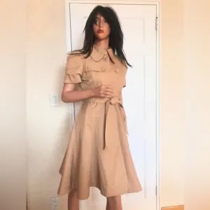 Bebe beige belted short sleeved flare trench coat in sz M. Great condition!