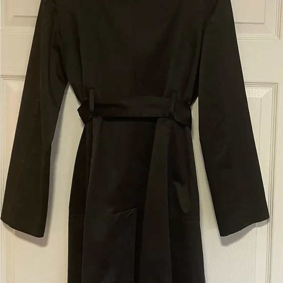 BEBE Black Belted Trench Coat Super Unique and Versatile Size Medium.