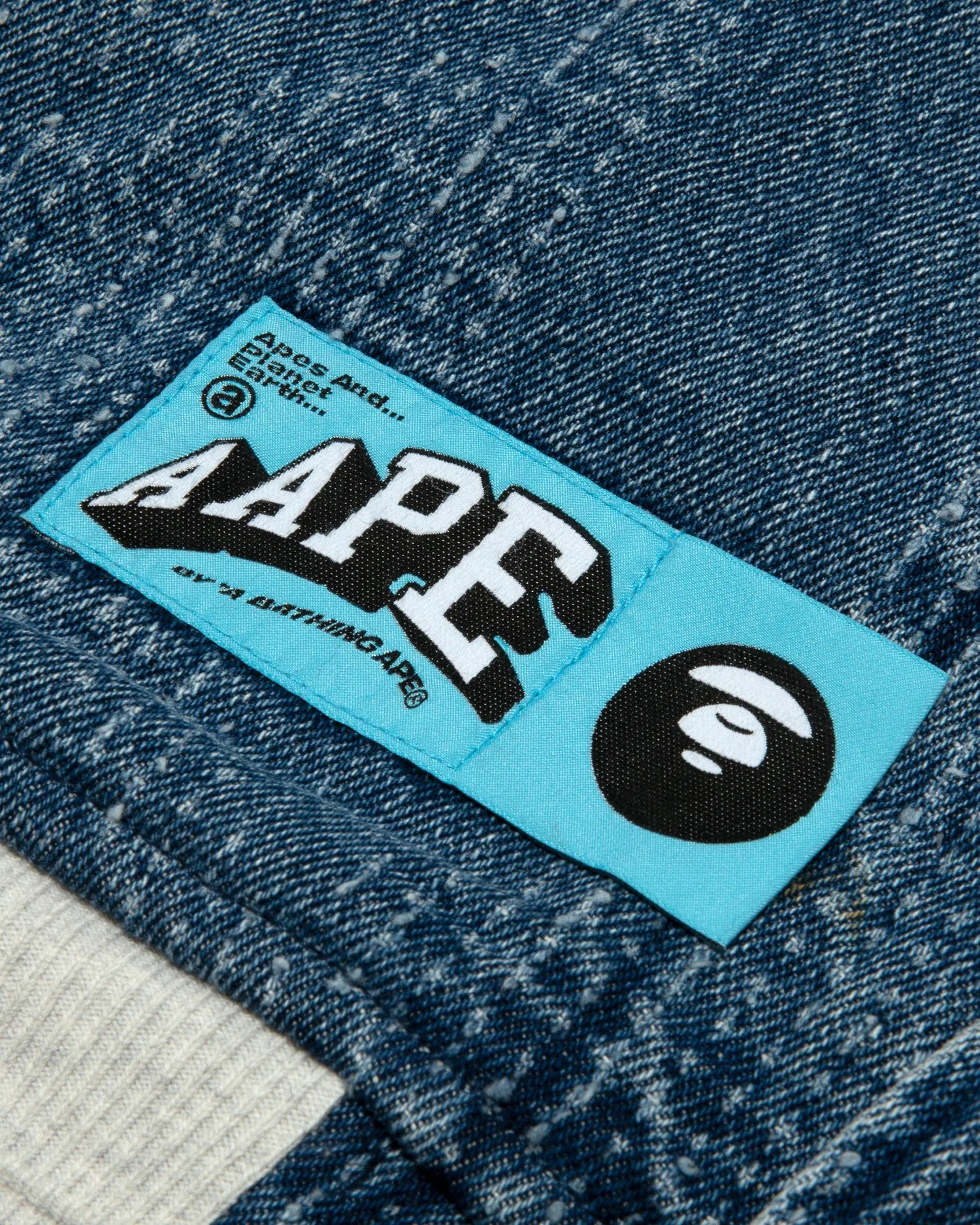 Moonface logo denim baseball jacket