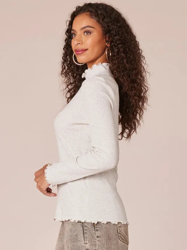 The Kai Mock Neck Lettuce Edge Long Sleeve Top